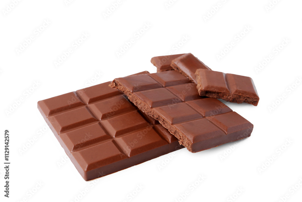 Pieces of delicious milk chocolate isolated on white Pieces of delicious milk chocolate isolated on white