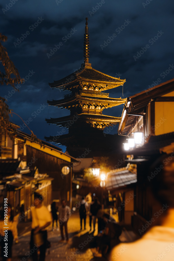 View of Gion district street, Kyoto, Higashiyama-ku, Japan, night illumination of Ninnenzaka and Sannenzaka streets, with old wooden tea houses Hokanji temple and Yasaka Pagoda, Gion geisha quarter View of Gion district street, Kyoto, Higashiyama-ku, Japan, night illumination of Ninnenzaka and Sannenzaka streets, with old wooden tea houses Hokanji temple and Yasaka Pagoda, Gion geisha quarter