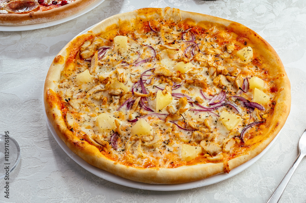 traditional Italian pizza on a white plate traditional Italian pizza on a white plate