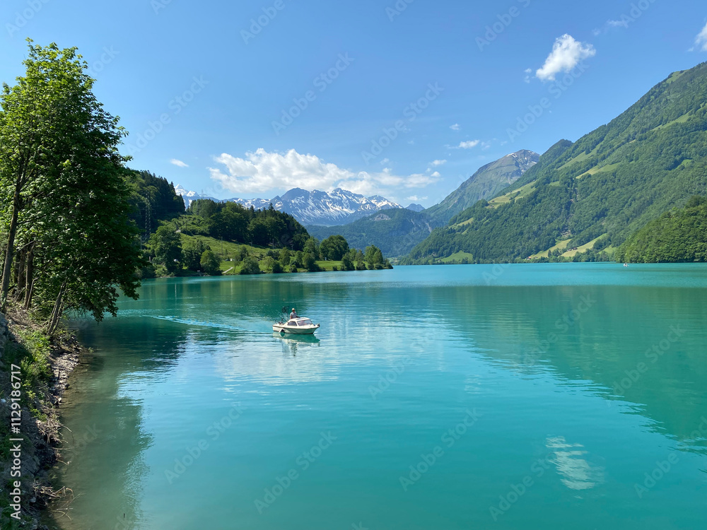 Fishermens on the Lake Lungern or Natural reservoir Lungerersee - Canton of Obwald, Switzerland (Fischer am Naturstausee Lungernsee oder Lungerensee - Kanton Obwald, Schweiz) Fishermens on the Lake Lungern or Natural reservoir Lungerersee - Canton of Obwald, Switzerland (Fischer am Naturstausee Lungernsee oder Lungerensee - Kanton Obwald, Schweiz)