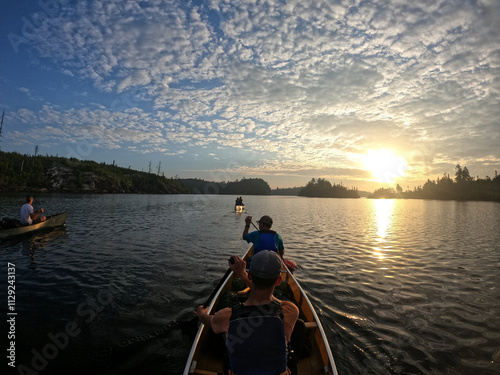 Konstfotografi first person view of a group of canoe boats at the Boundary Canoe Wilderness Are