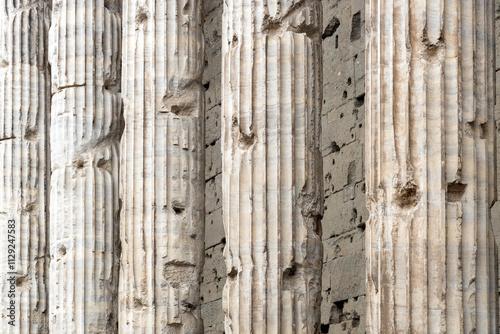 Detail of the Corinthian columns of the Temple of Hadrian in Rome, Italy