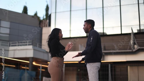 Young couple is having a disagreement in the city