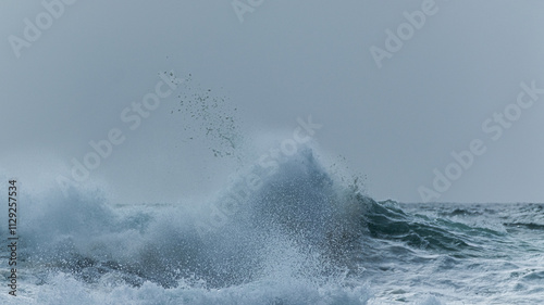 waves crashing on the rocks
