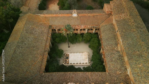Orange trees patio with old stone stage aerial view