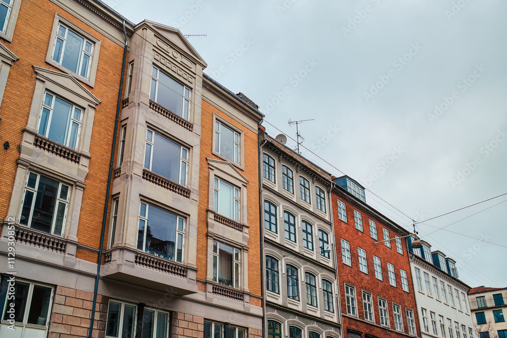 Fototapeta premium Architectural colorful facade of classic style urban building in Copenhagen, Denmark