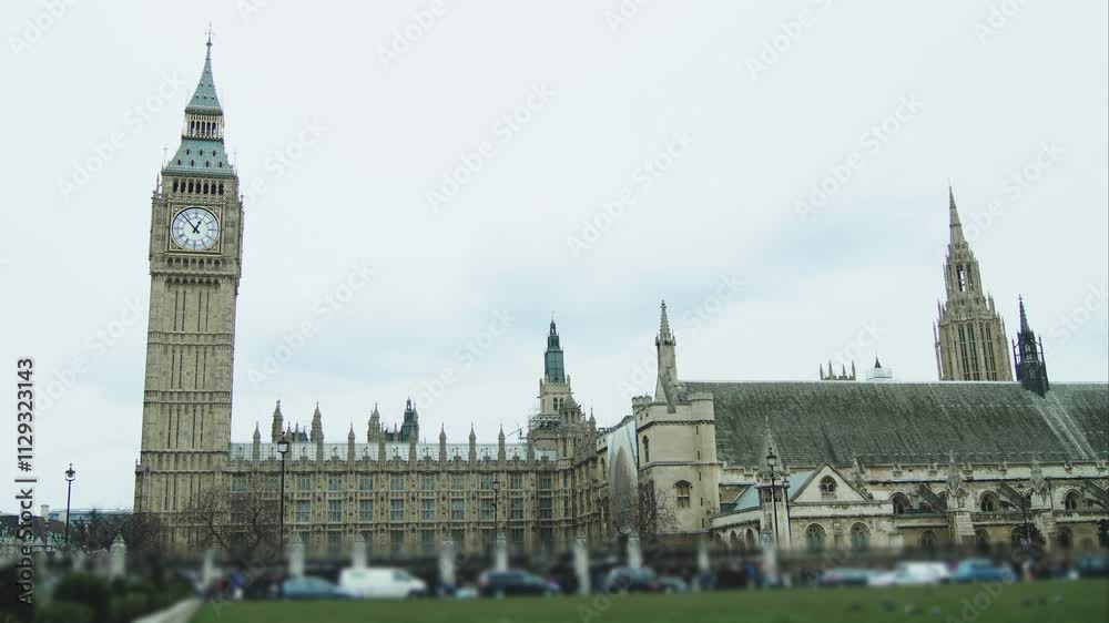 Cars drive along the length of Parliament with Big Ben clock tower, time lapse. Cars drive along the length of Parliament with Big Ben clock tower, time lapse.