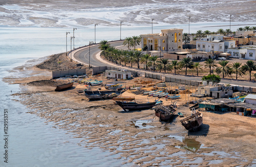 Sur, Oman. Traditional ships Dhow in the lagoon. Travel and summer tourism in Arab countries photo