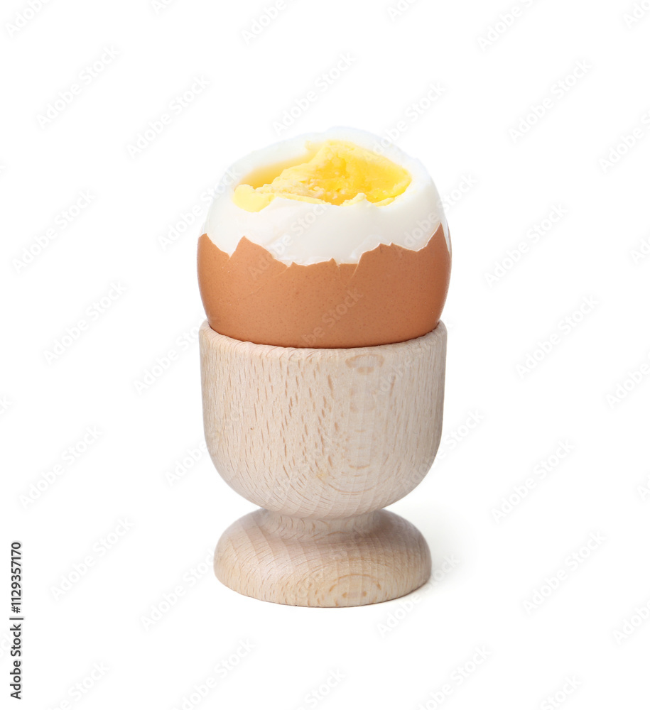 Soft boiled egg in eggcup isolated on white Soft boiled egg in eggcup isolated on white