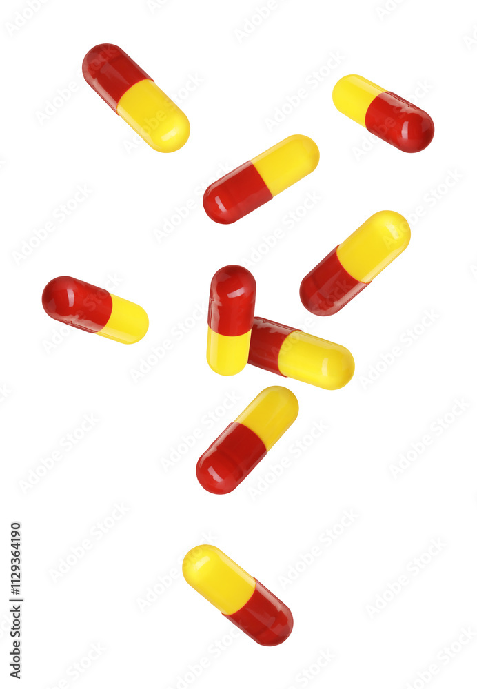 Antibiotic pills in air on white background Antibiotic pills in air on white background