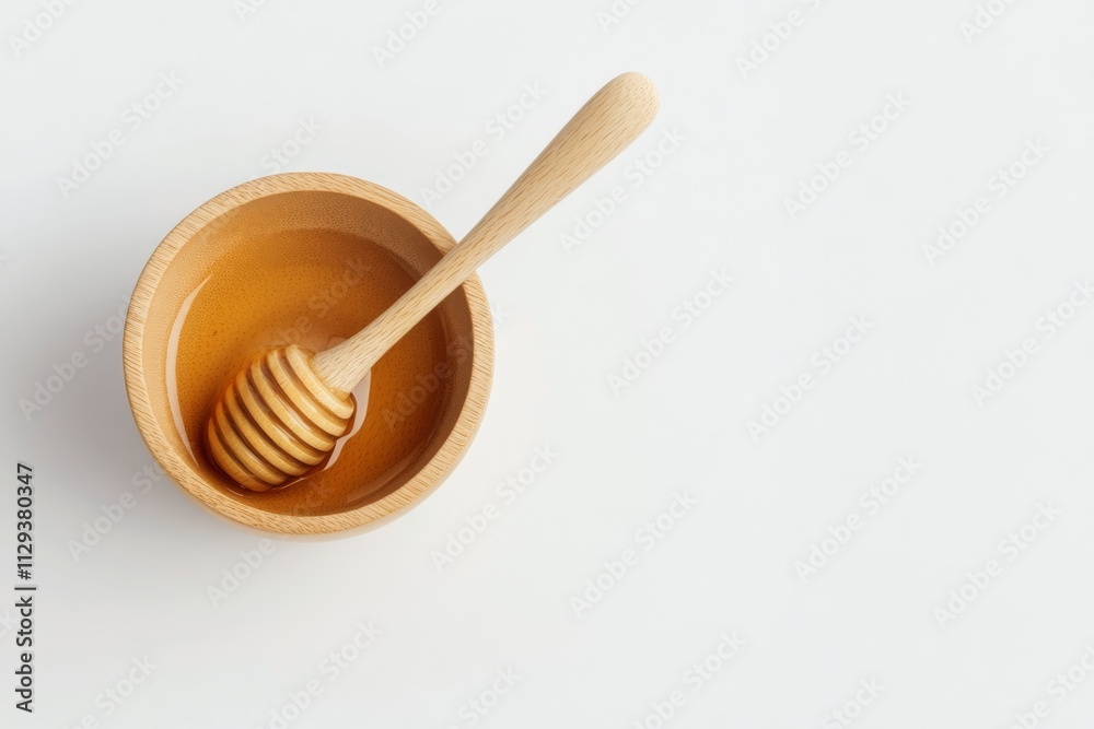Wooden bowl with spoon on a plain background for culinary presentation Wooden bowl with spoon on a plain background for culinary presentation