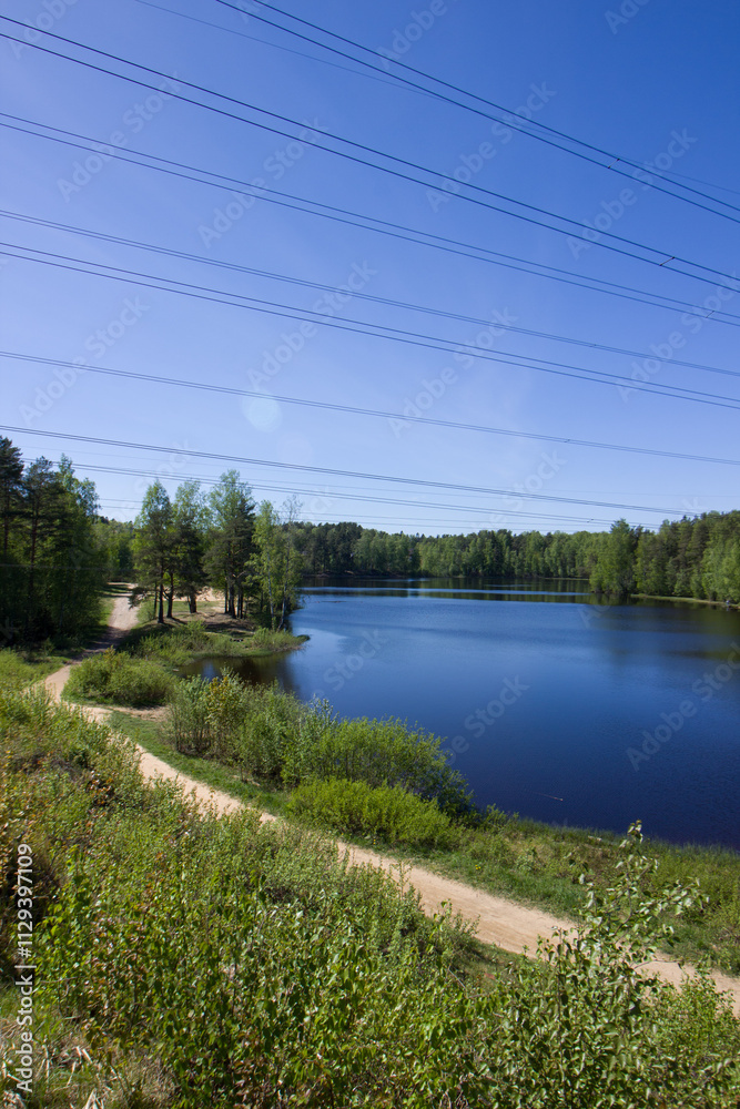 Obraz premium Blue lake in the forest. Yukki village.