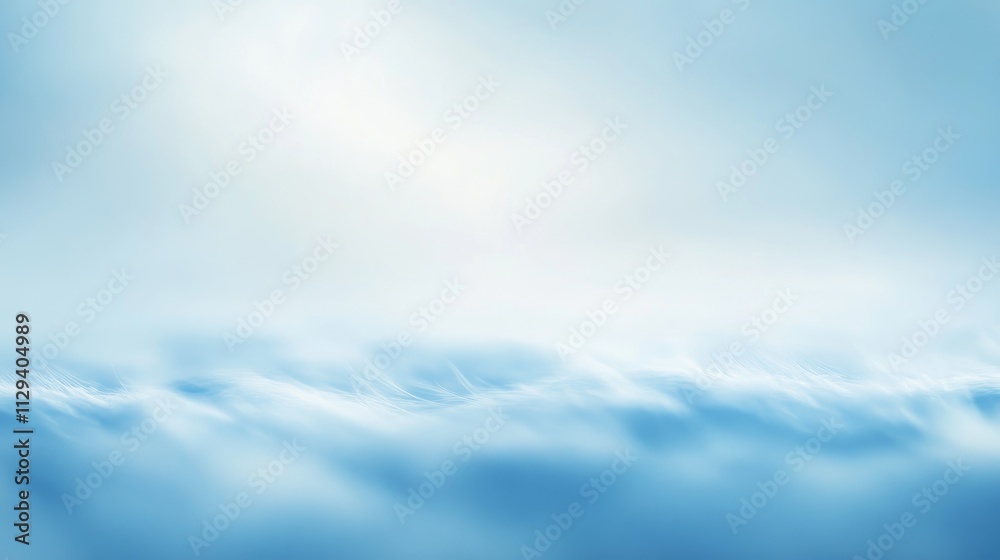 Fototapeta premium Aerial view of soft blurry white clouds under a clear blue sky ideal for nature and travel presentation backgrounds.
