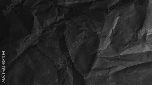 crumpled black paper