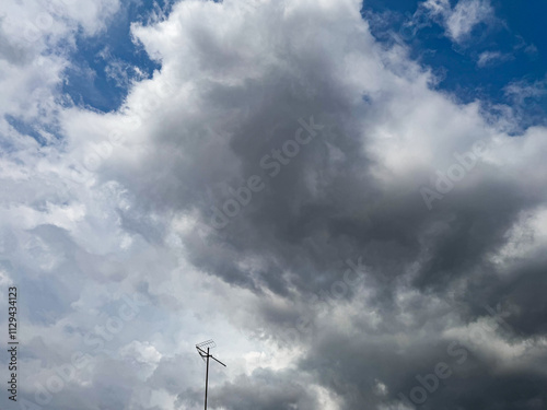 Big clouds floating in the sky Forming together into rain clouds in the afternoon