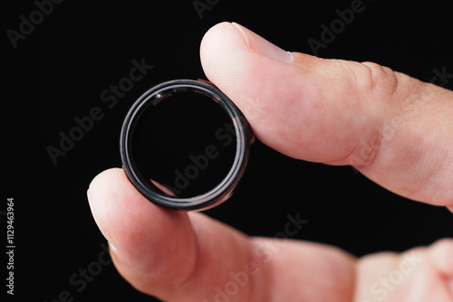 Black Tracker Smart Ring, Step Counter, Heart Rate, Blood Oxygen Tracker, Health Ring. Close-up. 