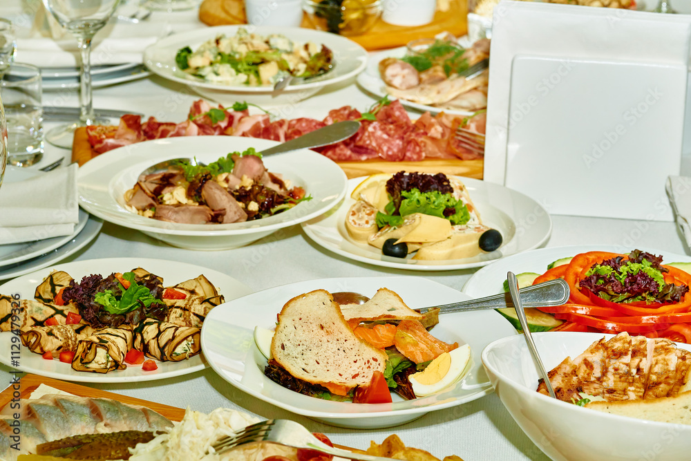 Festive delicious appetizers,snacks and salads on the banquet wedding table Festive delicious appetizers,snacks and salads on the banquet wedding table