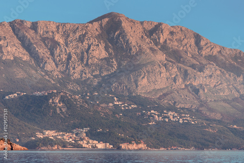 Scenic view of mountains meeting the sea in Montenegro, creating a tranquil and picturesque landscape photo