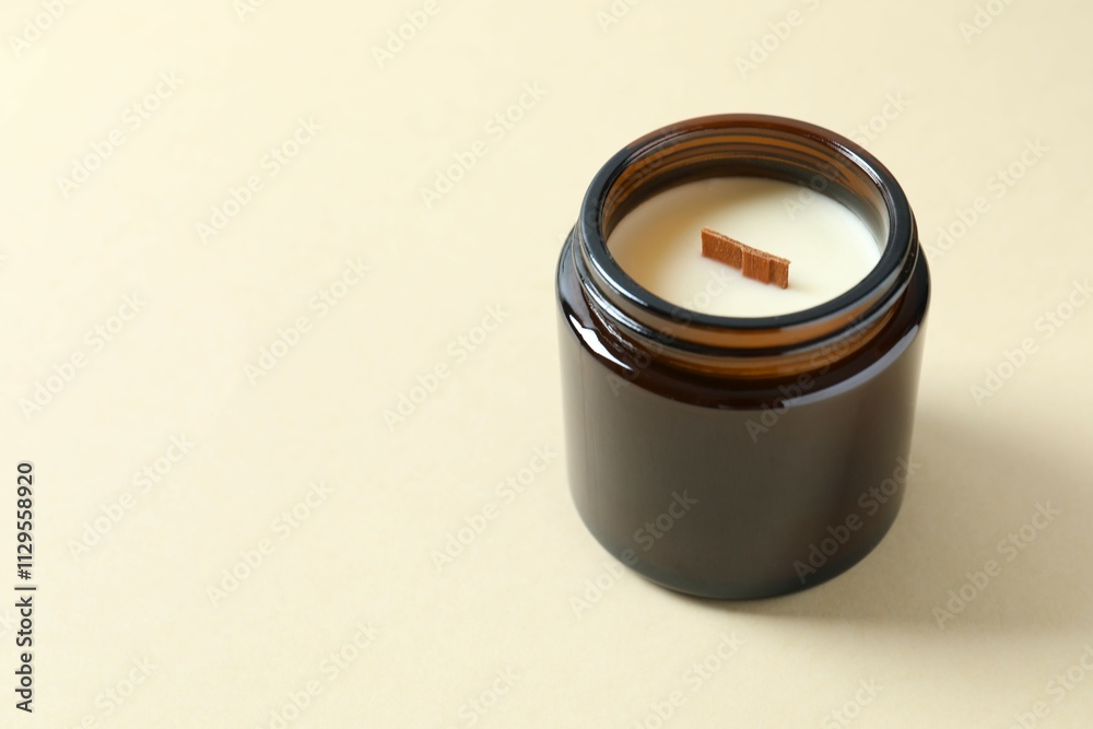Handmade scented candle in a glass. Soy wax candle with a wooden wick Handmade scented candle in a glass. Soy wax candle with a wooden wick