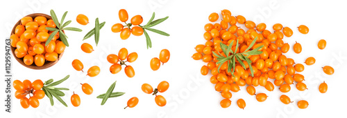 Sea buckthorn in wooden bowl. Fresh ripe berry with leaves isolated on white background. Top view. Flat lay pattern