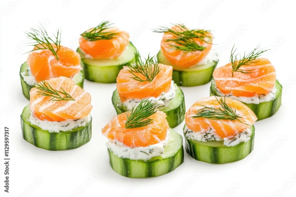 Delicious appetizers featuring salmon cucumber cream cheese and dill set against a white background