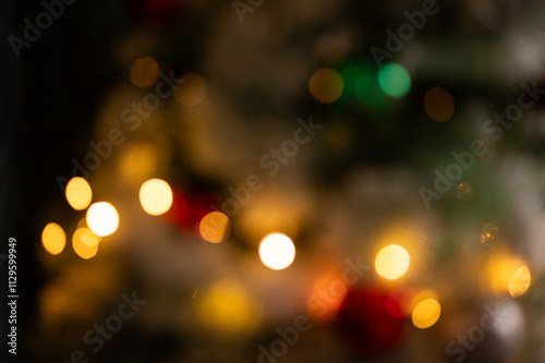 bokeh lights on a Christmas tree holiday background