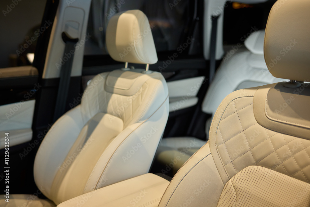 Fototapeta premium Discover the Stylish Car Interior with Premium Leather Seats for elegance and comfort