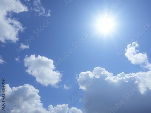 Beautiful white fluffy clouds floating in a vibrant blue summer sky, beauty, blue sky