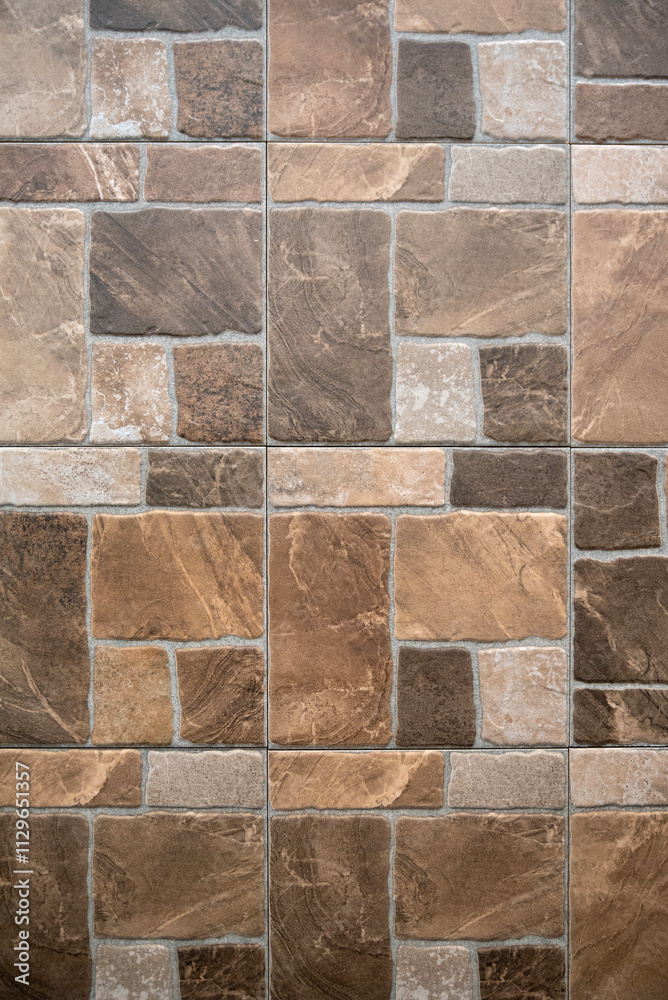 Fototapeta premium Textured ceramic floor tiles with a stone-like appearance