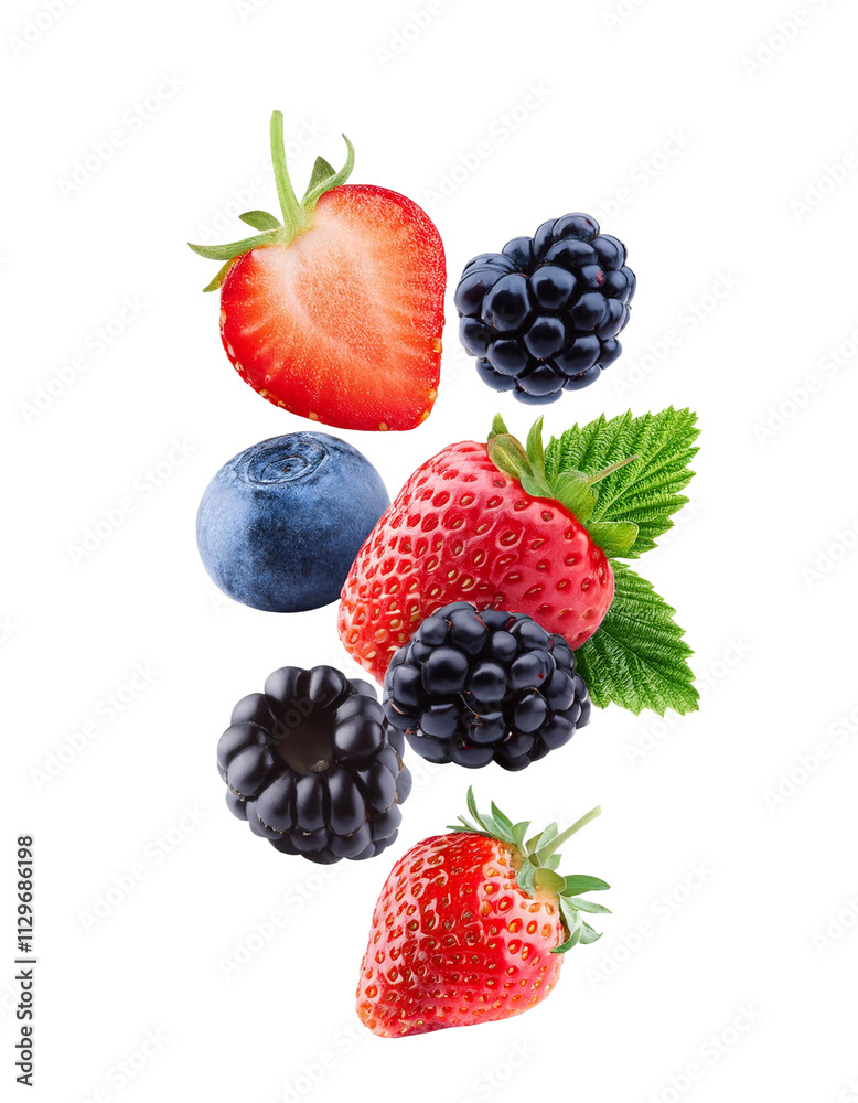Strawberries, blueberries and blackberries falling on transparent background