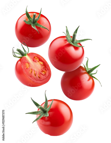 Fresh cherry tomatoes falling on transparent background