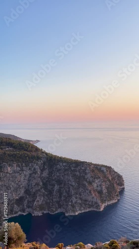 Vibrant pink red sunset dusk sky clouds flying over aerial view