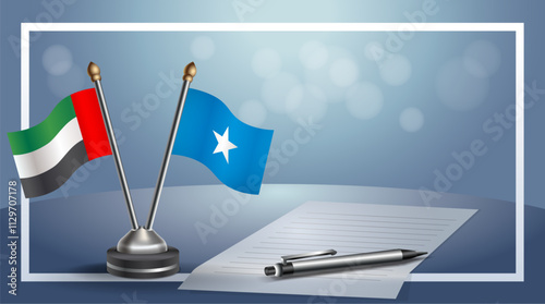 United Arab Emirate and Somalia National flags on small table with bokeh background, cooperative relationship