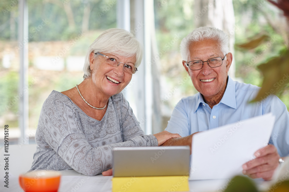 Senior couple, tablet and paperwork for portrait with smile for profit, goal or investment growth in home. Elderly man, woman and documents with touchscreen, review or finance for retirement in Spain Senior couple, tablet and paperwork for portrait with smile for profit, goal or investment growth in home. Elderly man, woman and documents with touchscreen, review or finance for retirement in Spain