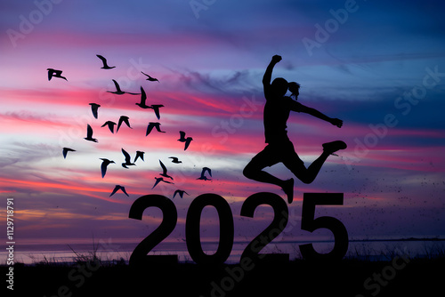 Silhouette mid jump, 2025 foreground, vibrant sky and birds inspire aspirations photo