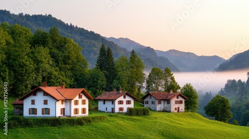 Scenic Mountain Village with White Houses and Lush Green Landscape