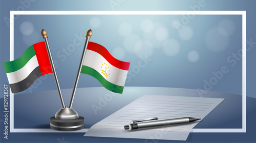 United Arab Emirate and Tajikistan National flags on small table with bokeh background, cooperative relationship