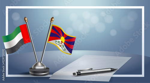 United Arab Emirate and Tibet National flags on small table with bokeh background, cooperative relationship