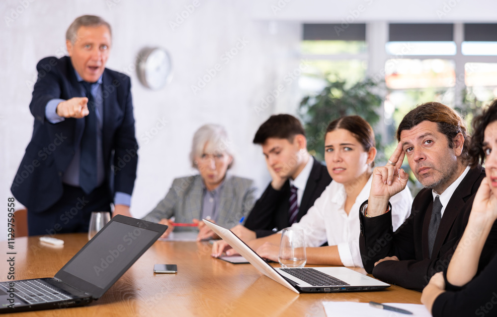 Dissatisfied boss gave dressing down to team of top managers in the office Dissatisfied boss gave dressing down to team of top managers in the office