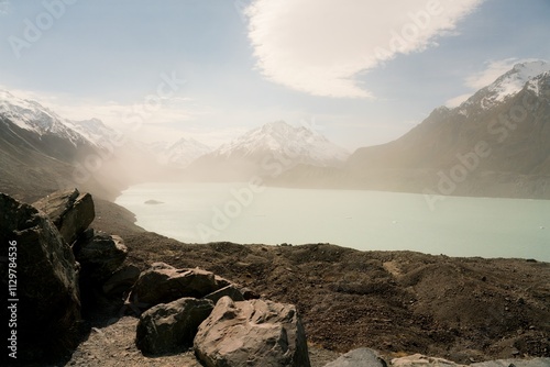 Принти на полотні Tasman Lake on a Hazy Day, Serene Alpine Scenery in New Zealand