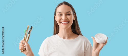 Young woman with tooth powd...
