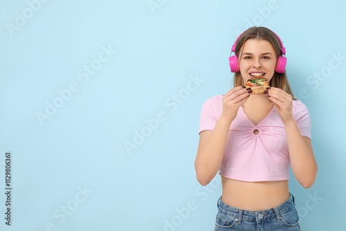 Teenage girl eating delicio...