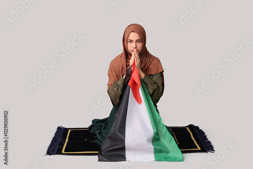 Young Muslim woman with Pal...