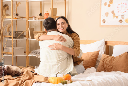 Happy young couple hugging ...