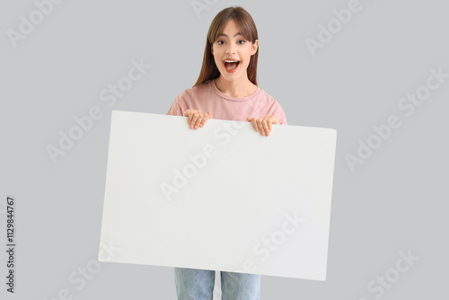 Happy young woman with blan...