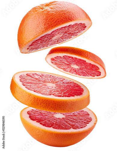 Yet another vibrant juicy slice of falling grapefruit isolated on white with segments in full depth of field
