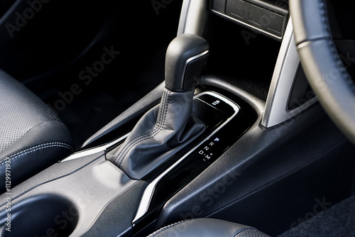 automatic transmission shift selector in the car interior. Closeup a manual shift of modern car gear shifter. 4x4 gear shift