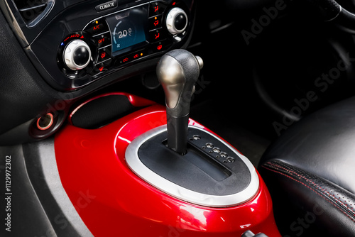 automatic transmission shift selector in the car interior. Closeup a manual shift of modern car gear shifter. 4x4 gear shift photo