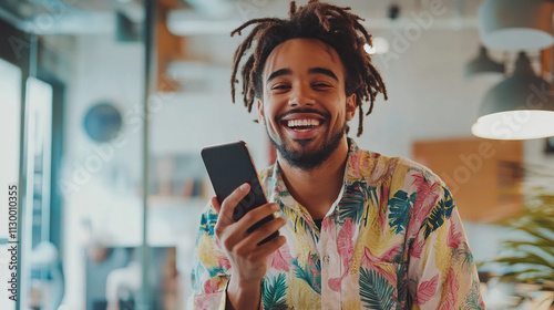 Happy Man Using Smartphone  Smiling  Dreadlocks  Casual