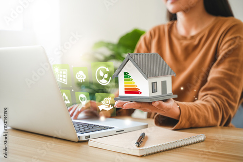 Energy-saving homes, energy efficiency concepts, eco-friendly home improvements, cost savings, low-energy eco-friendly homes, green handshake.